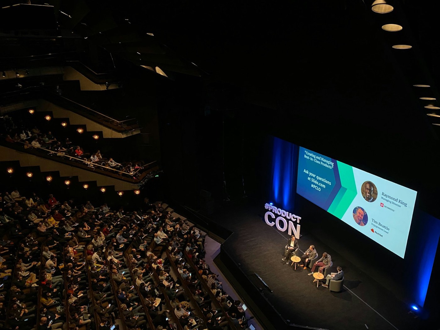 Panel discussion on a conference stage